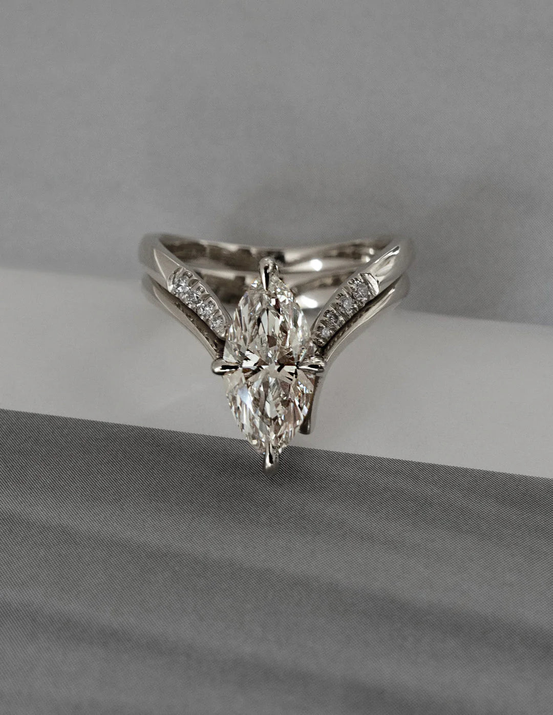 Marquise engagement ring with band