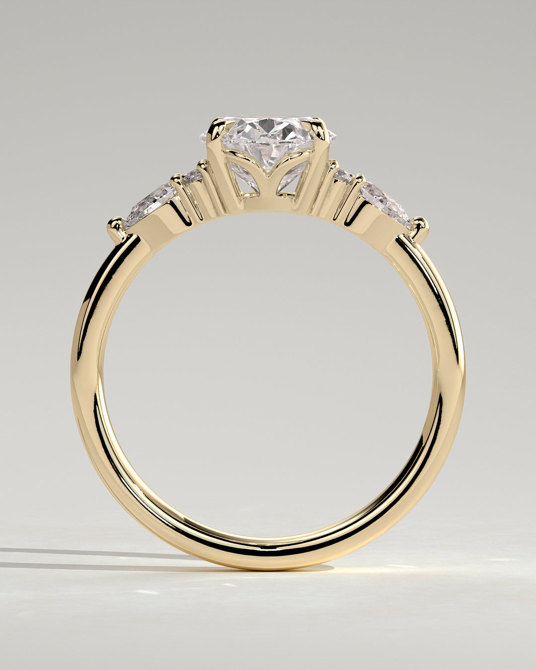 modern oval engagement ring pear side stones