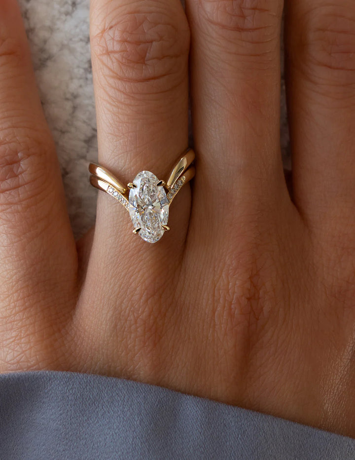 Oval diamond ring with matching band